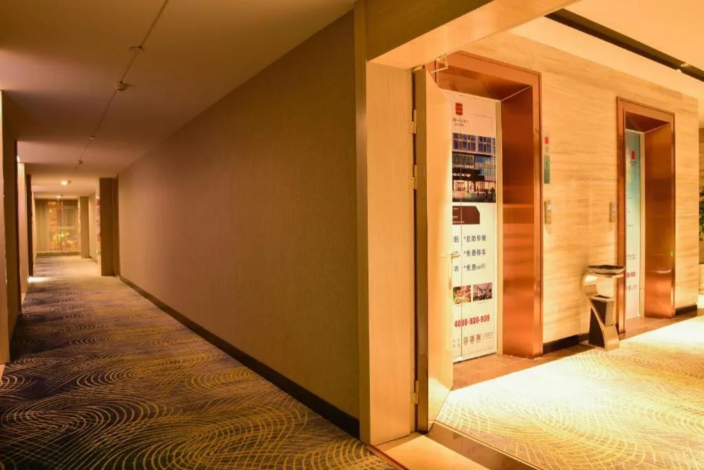 Bed in Echarm Hotel Xiantao Yuantai Weilaicheng