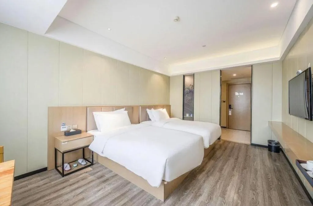 Bed in Borrman Hotel Xiamen Xiang'an Maxiang