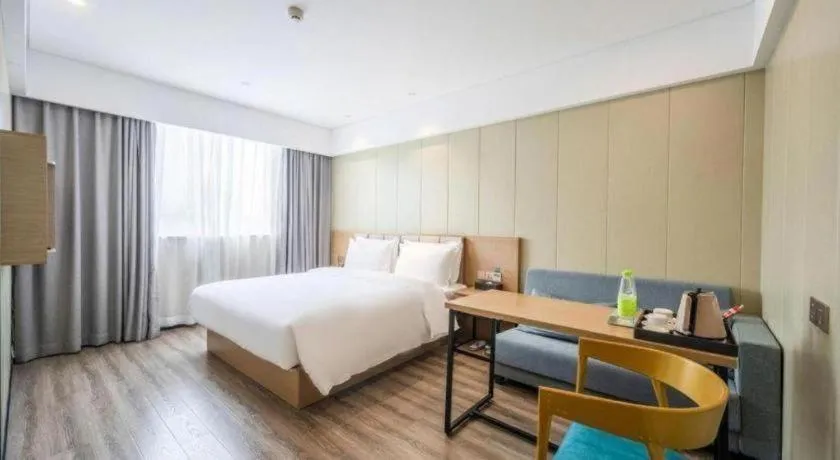 Bed in Borrman Hotel Xiamen Xiang'an Maxiang