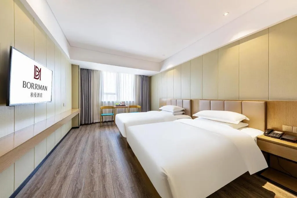 Bed in Borrman Hotel Xiamen Xiang'an Maxiang