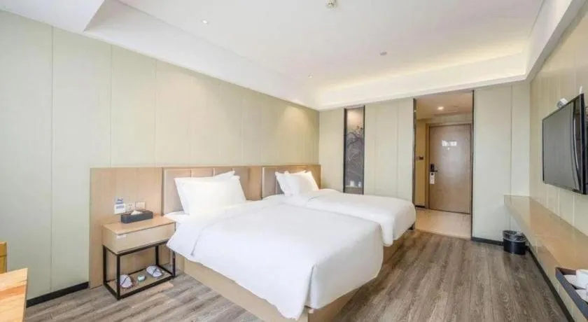 Bed in Borrman Hotel Xiamen Xiang'an Maxiang