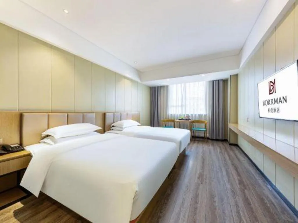 Bed in Borrman Hotel Xiamen Xiang'an Maxiang