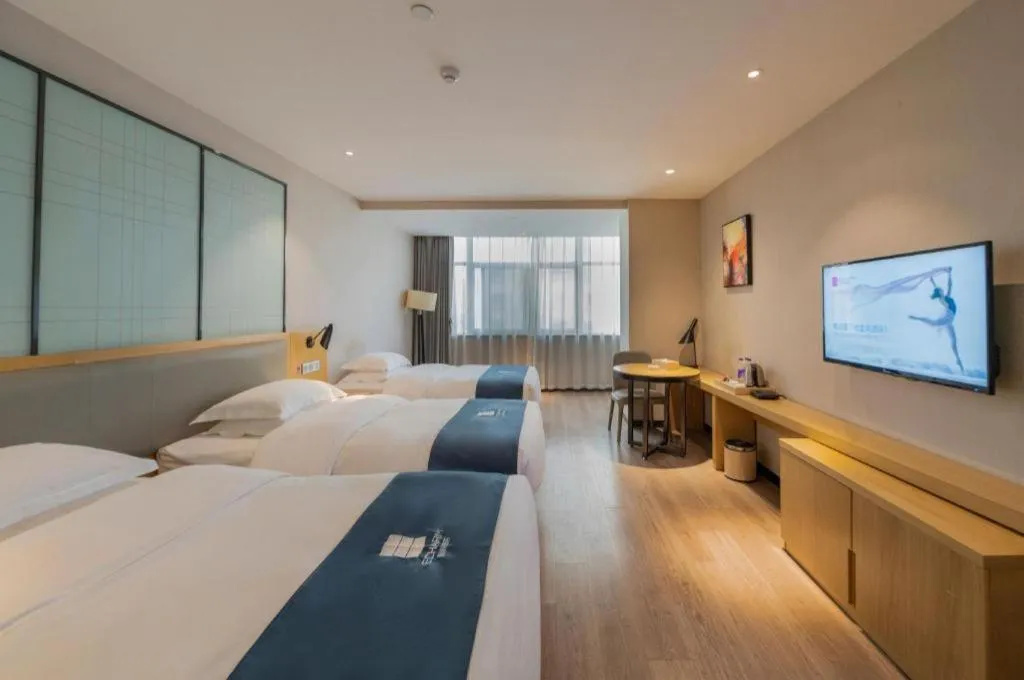 Bed in Echarm Hotel Hefei Binhu Exhibition Center