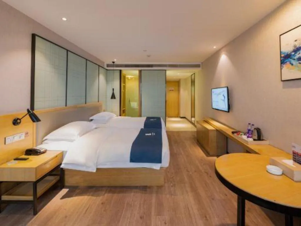 Bed in Echarm Hotel Hefei Binhu Exhibition Center