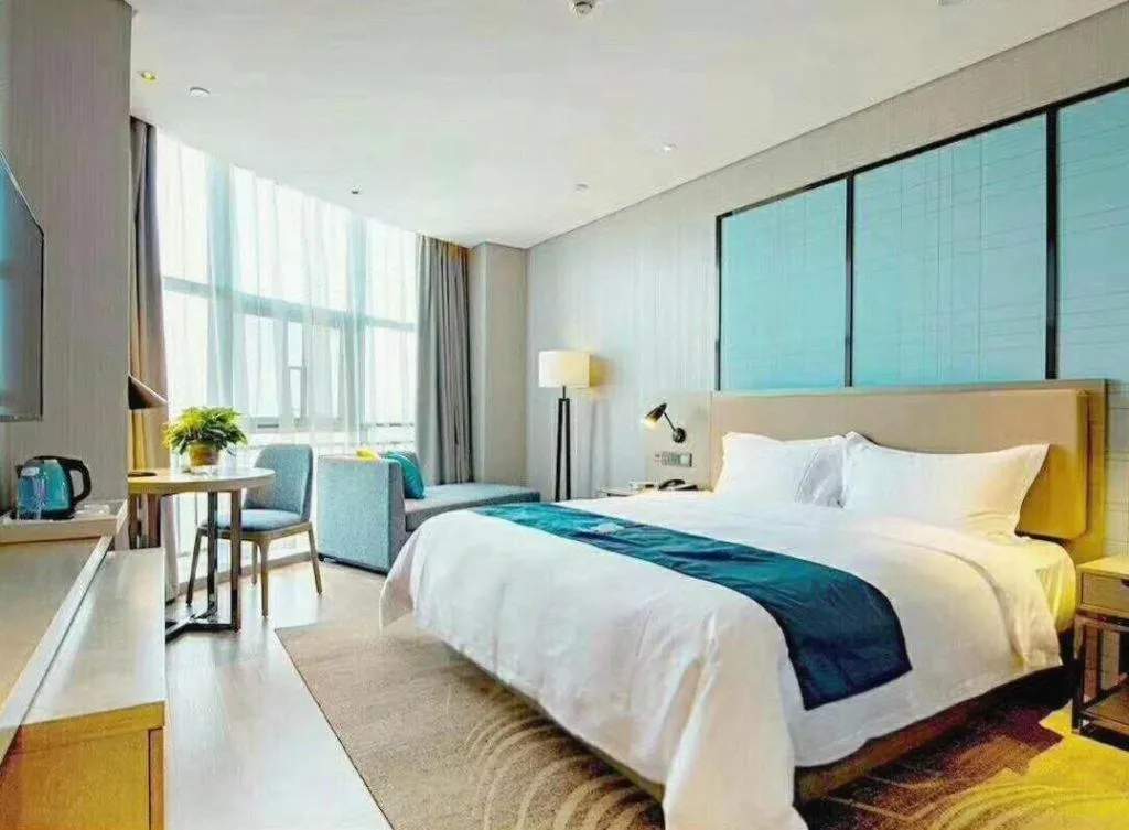 Bed in Echarm Hotel Hefei Binhu Exhibition Center
