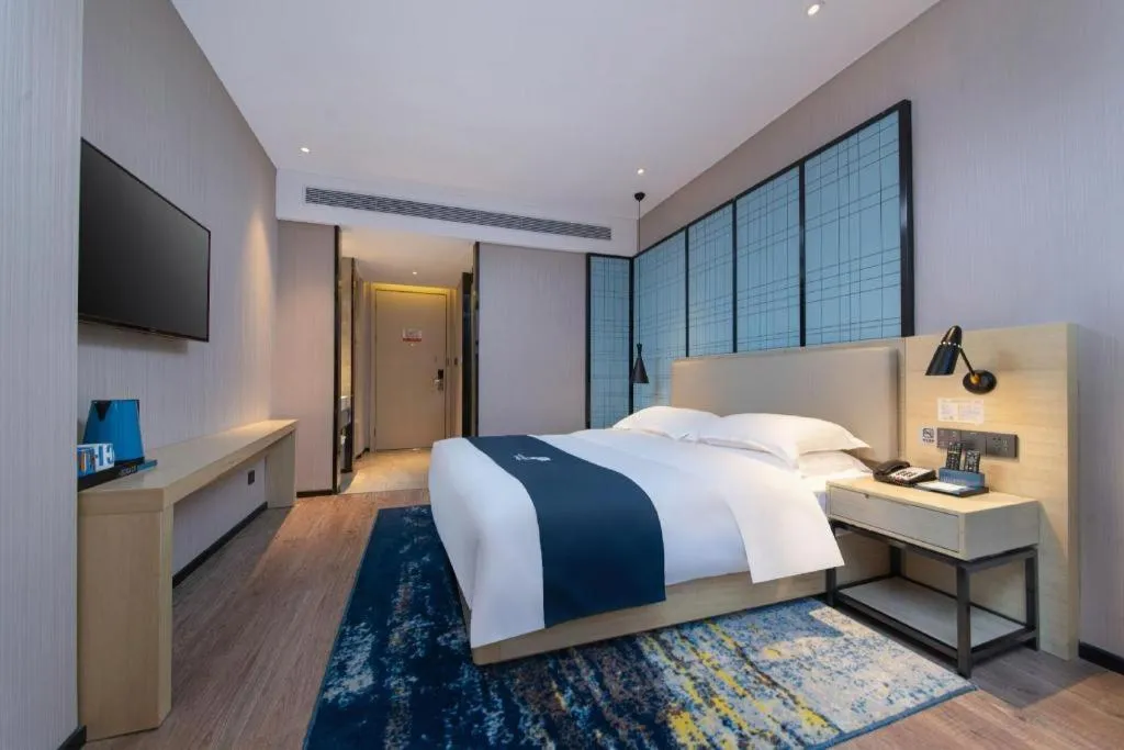 Bed in Echarm Hotel Hefei Binhu Exhibition Center