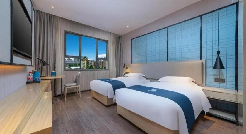 Bed in Echarm Hotel Hefei Binhu Exhibition Center