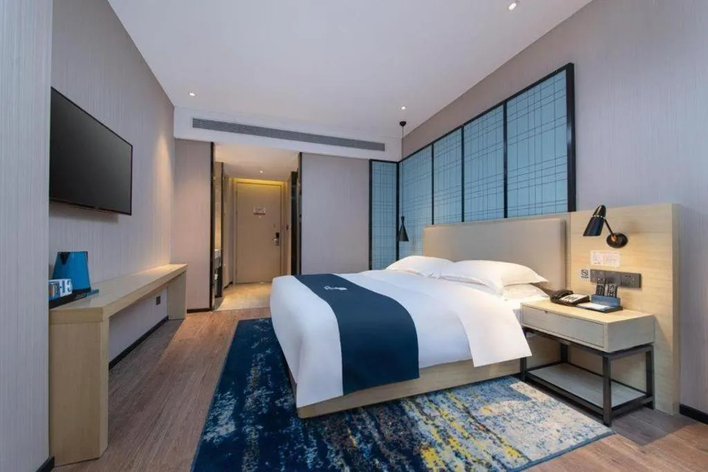 Bed in Echarm Hotel Hefei Binhu Exhibition Center