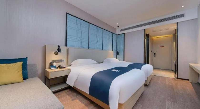 Bed in Echarm Hotel Hefei Binhu Exhibition Center