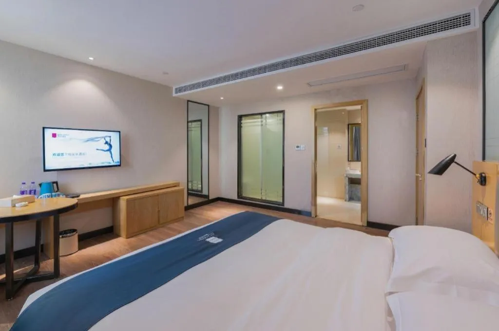 Bed in Echarm Hotel Hefei Binhu Exhibition Center