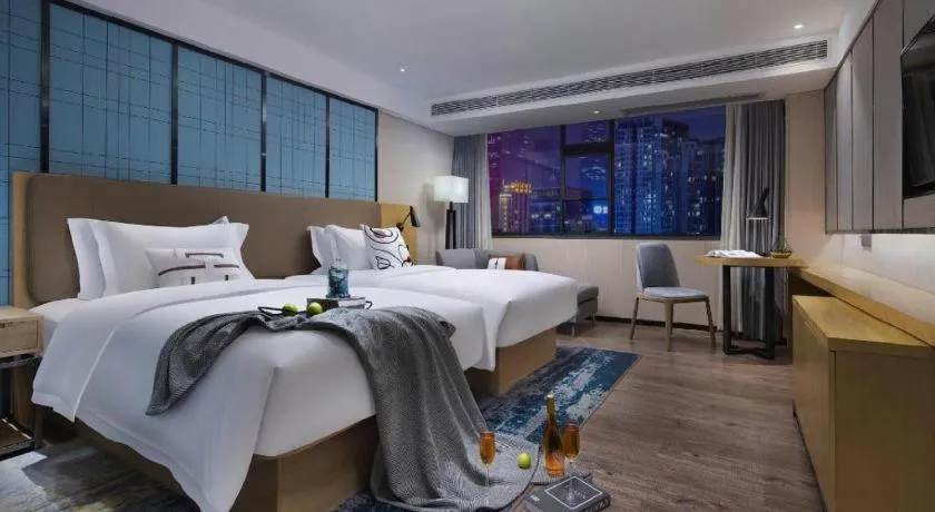 Bed in Echarm Hotel Hefei Binhu Exhibition Center