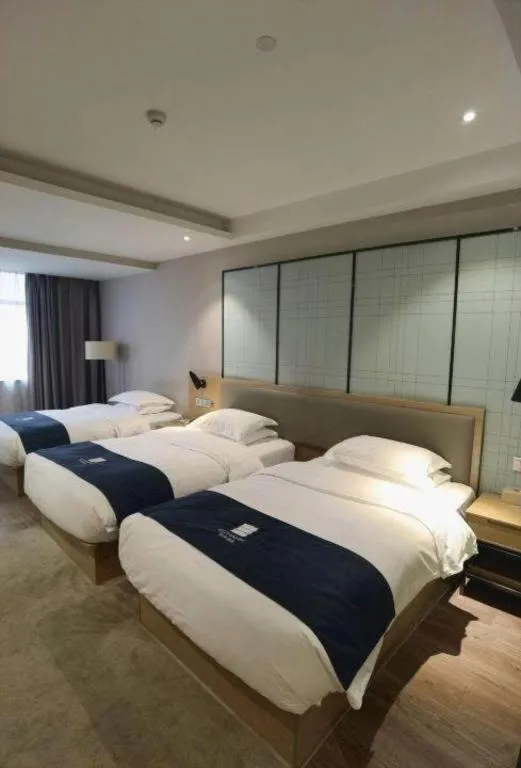 Bed in Echarm Hotel Hefei Binhu Exhibition Center