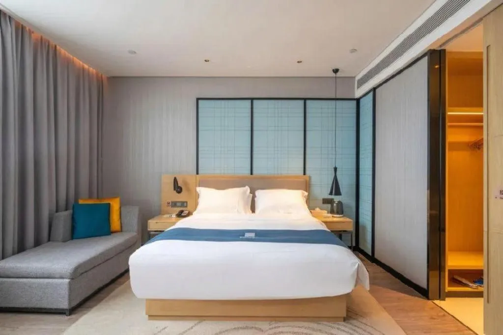 Bed in Echarm Hotel Hefei Binhu Exhibition Center