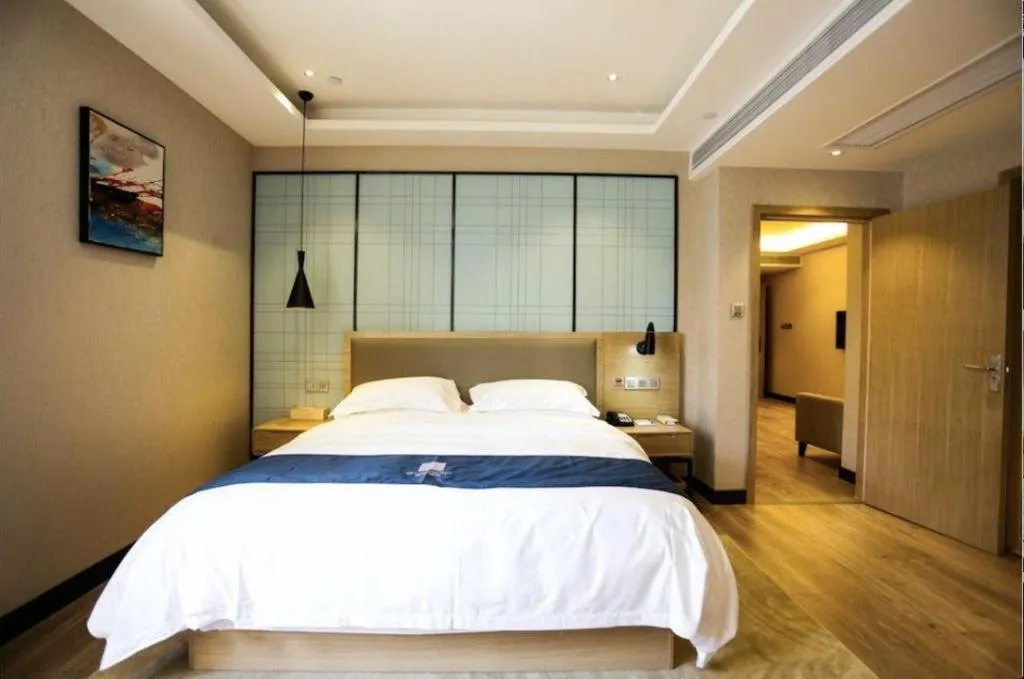 Bed in Echarm Hotel Hefei Binhu Exhibition Center