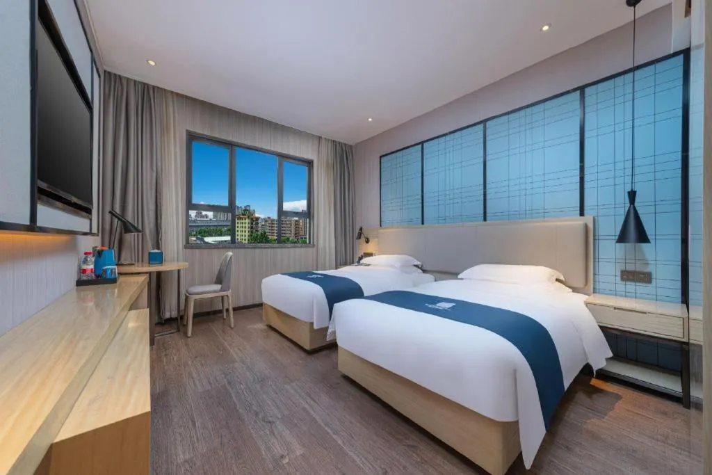 Bed in Echarm Hotel Hefei Binhu Exhibition Center