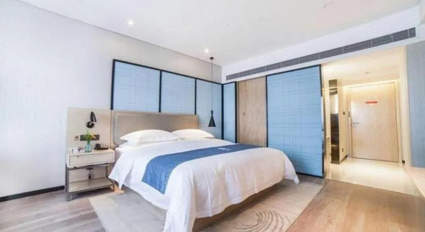 Bed in Echarm Hotel Hefei Binhu Exhibition Center