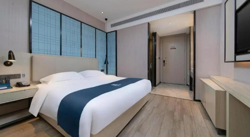 Bed in Echarm Hotel Hefei Binhu Exhibition Center