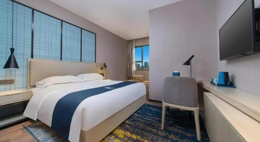 Bed in Echarm Hotel Hefei Binhu Exhibition Center