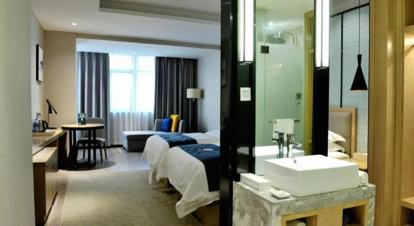 Bed in Echarm Hotel Hefei Binhu Exhibition Center