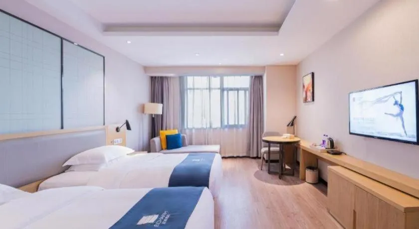 Bed in Echarm Hotel Hefei Binhu Exhibition Center