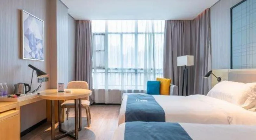 Bed in Echarm Hotel Hefei Binhu Exhibition Center