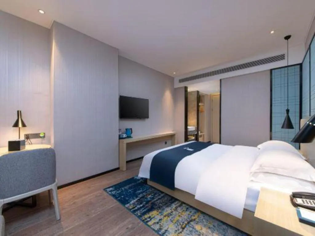 Bed in Echarm Hotel Hefei Binhu Exhibition Center