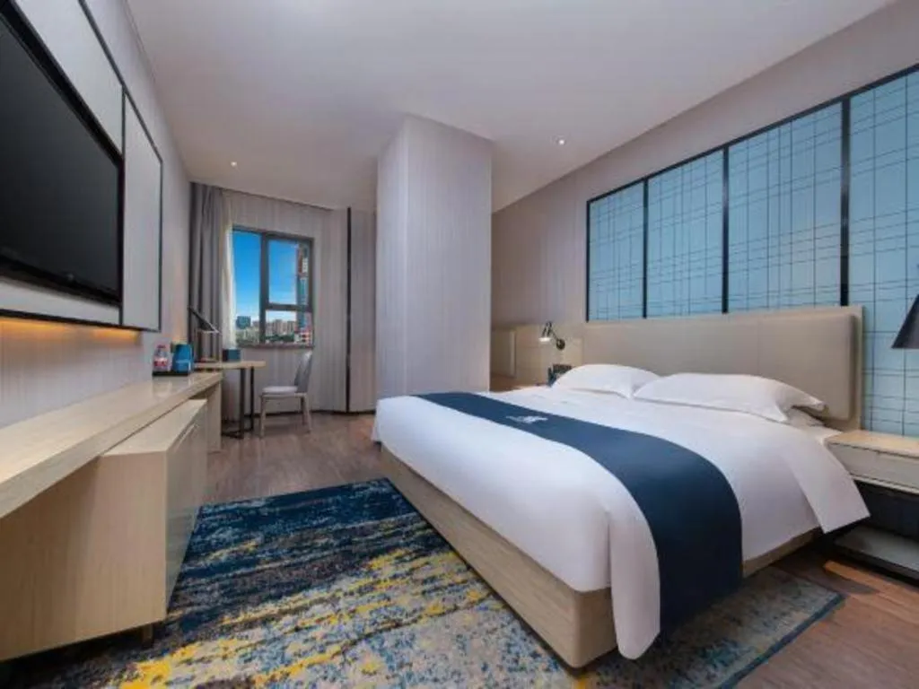 Bed in Echarm Hotel Hefei Binhu Exhibition Center