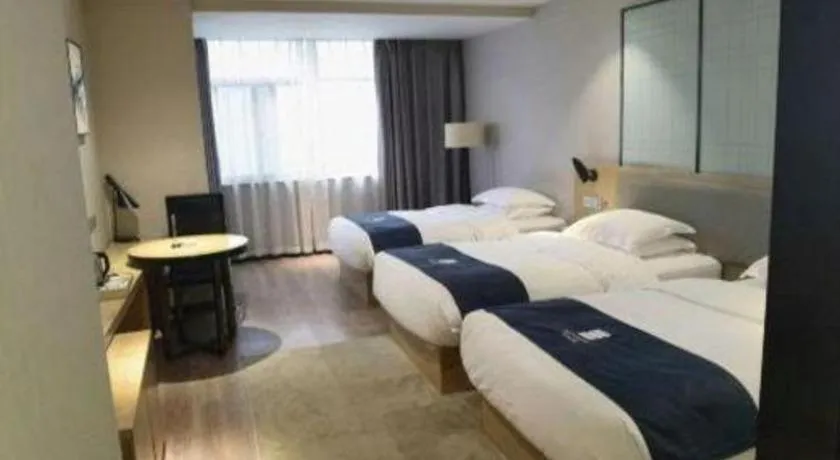 Bed in Echarm Hotel Hefei Binhu Exhibition Center