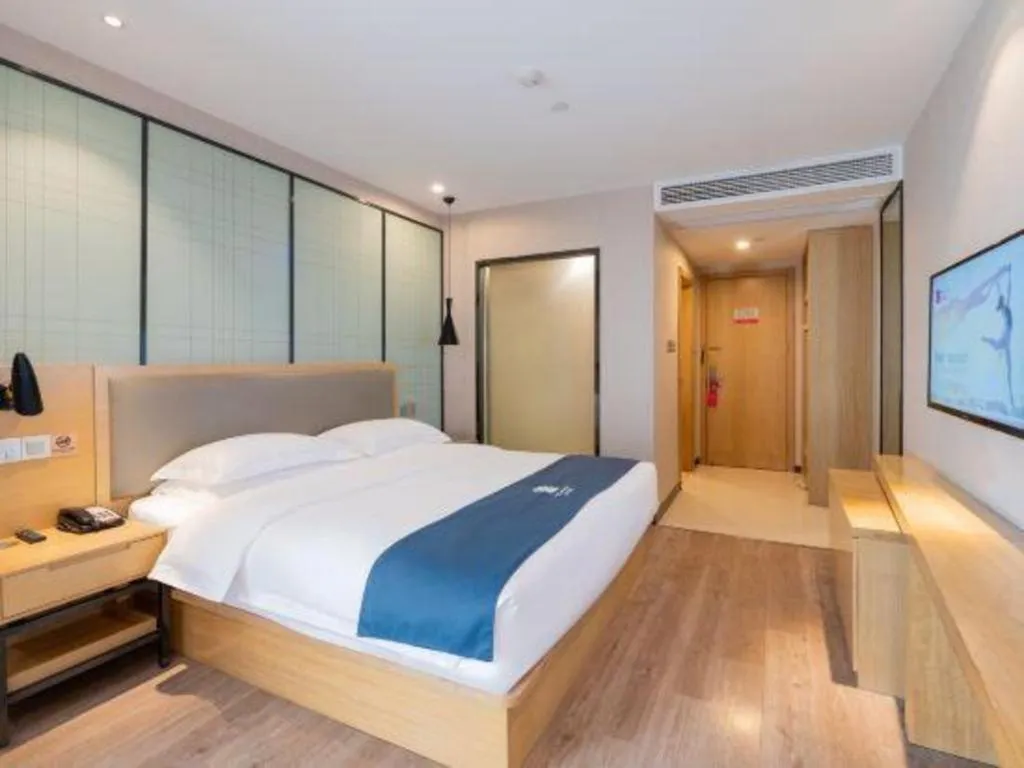 Bed in Echarm Hotel Hefei Binhu Exhibition Center