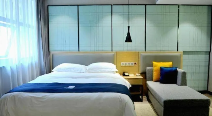 Bed in Echarm Hotel Hefei Binhu Exhibition Center