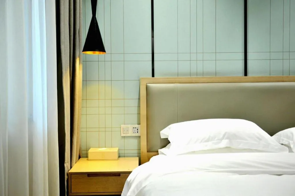Bed in Echarm Hotel Hefei Binhu Exhibition Center