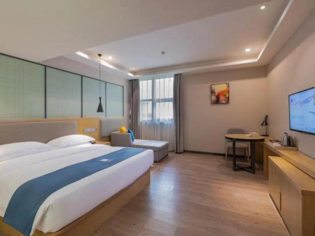 Bed in Echarm Hotel Hefei Binhu Exhibition Center