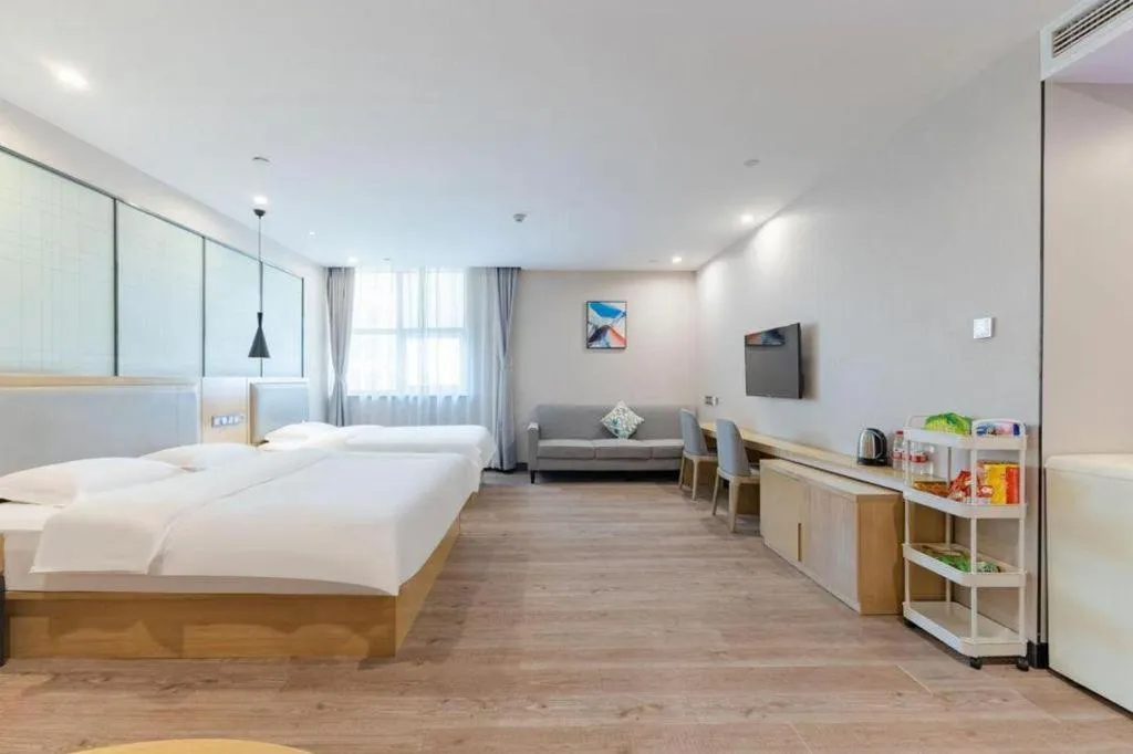 Bed in Echarm Hotel Hefei Binhu Exhibition Center