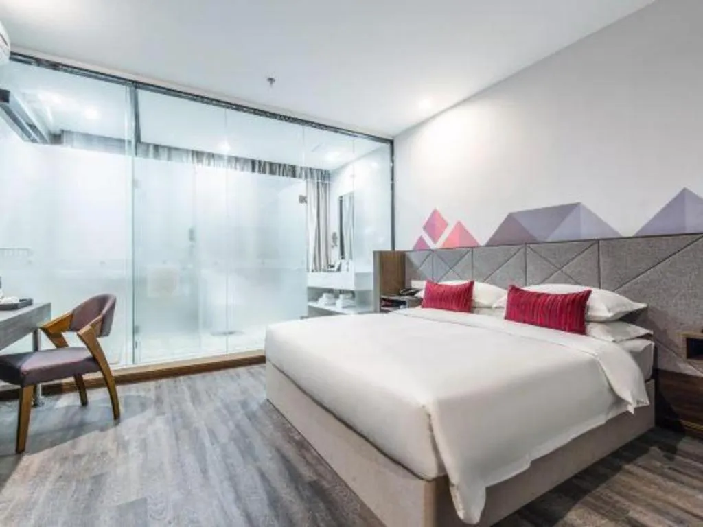 Bed in Borrman Hotel Wuxi Hubin Business Street