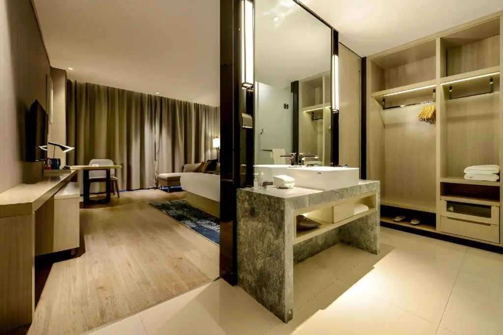 Bed in Echarm Hotel Guizhou Xingyi Jushan Avenue