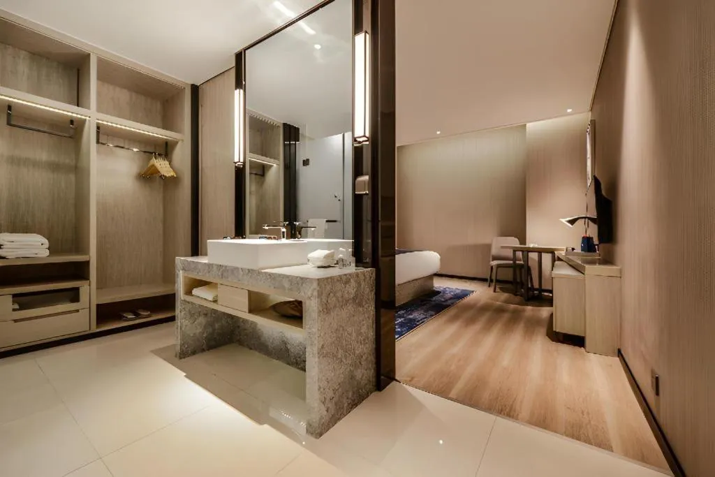 Bed in Echarm Hotel Guizhou Xingyi Jushan Avenue