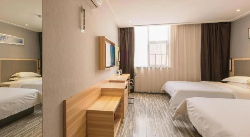 Bed in City Comfort Inn Hotel Zhangjiajie Railway Station Tianmen Mountain Cableway Station