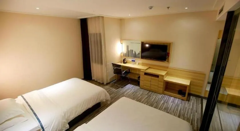 Bed in City Comfort Inn Hotel Zhangjiajie Railway Station Tianmen Mountain Cableway Station