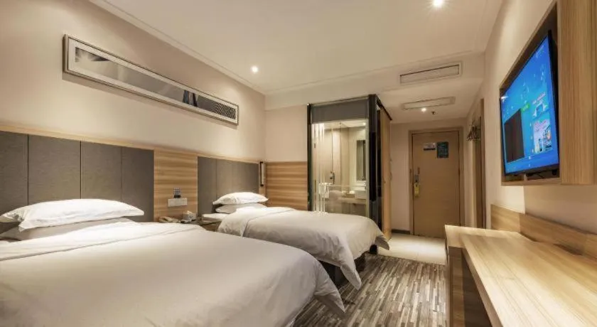 Bed in City Comfort Inn Hotel Zhangjiajie Railway Station Tianmen Mountain Cableway Station