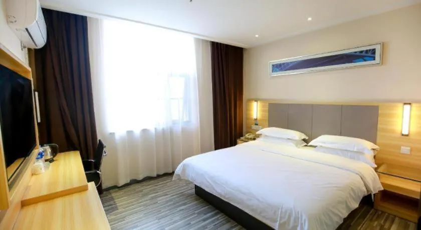 Bed in City Comfort Inn Hotel Zhangjiajie Railway Station Tianmen Mountain Cableway Station