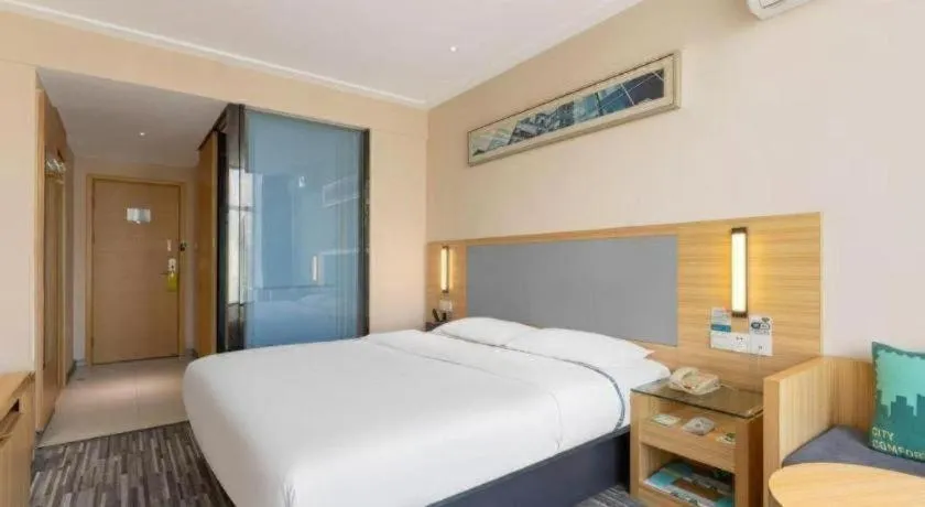 Bed in City Comfort Inn Hotel Zhangjiajie Railway Station Tianmen Mountain Cableway Station