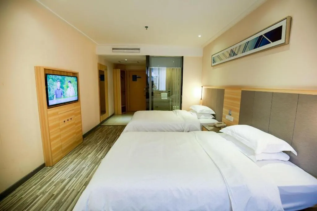 Bed in City Comfort Inn Hotel Zhangjiajie Railway Station Tianmen Mountain Cableway Station