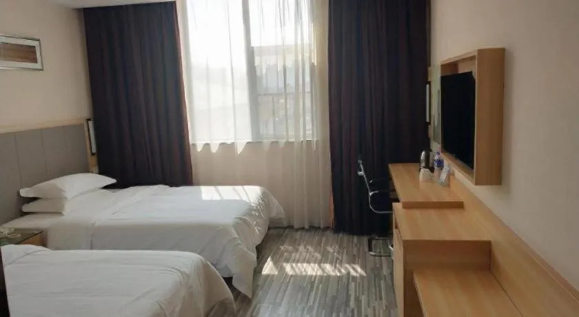 Bed in City Comfort Inn Hotel Zhangjiajie Railway Station Tianmen Mountain Cableway Station