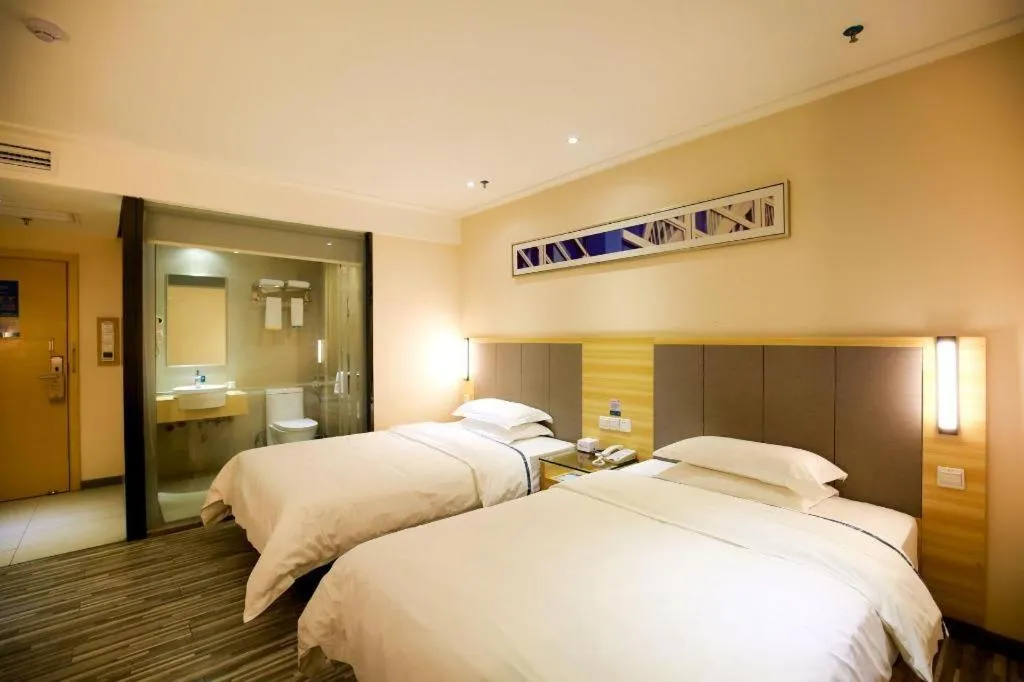Bed in City Comfort Inn Hotel Zhangjiajie Railway Station Tianmen Mountain Cableway Station
