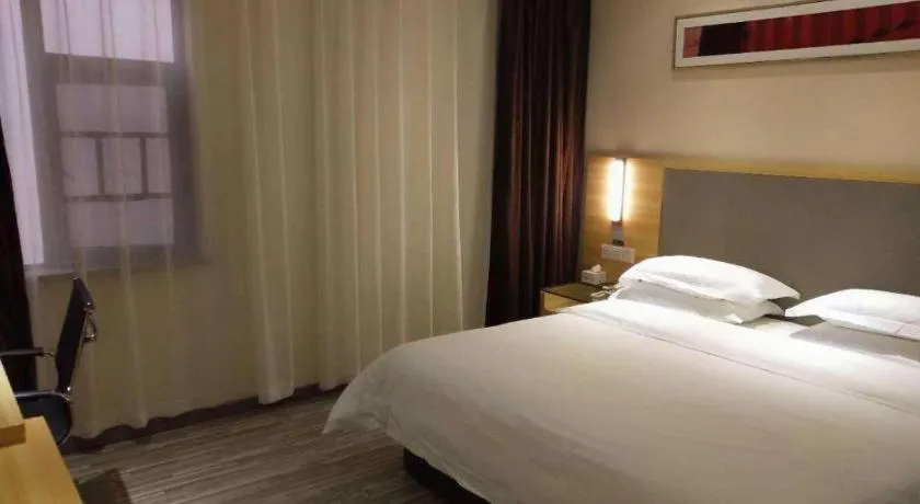 Bed in City Comfort Inn Hotel Zhangjiajie Railway Station Tianmen Mountain Cableway Station