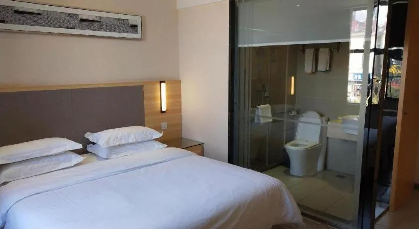 Bed in City Comfort Inn Hotel Zhangjiajie Railway Station Tianmen Mountain Cableway Station