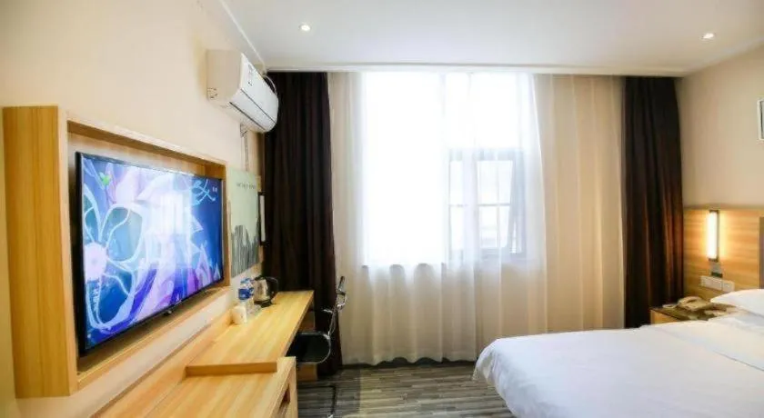 Bed in City Comfort Inn Hotel Zhangjiajie Railway Station Tianmen Mountain Cableway Station