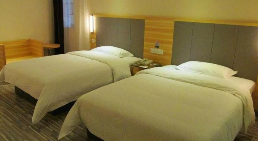Bed in City Comfort Inn Hotel Zhangjiajie Railway Station Tianmen Mountain Cableway Station