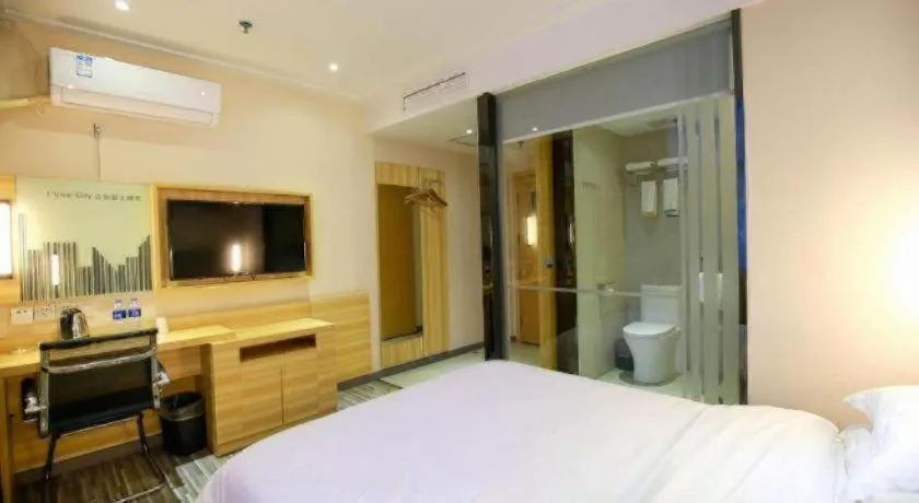 Bed in City Comfort Inn Hotel Zhangjiajie Railway Station Tianmen Mountain Cableway Station