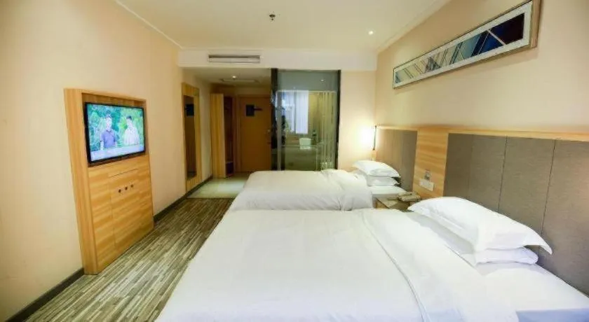 Bed in City Comfort Inn Hotel Zhangjiajie Railway Station Tianmen Mountain Cableway Station